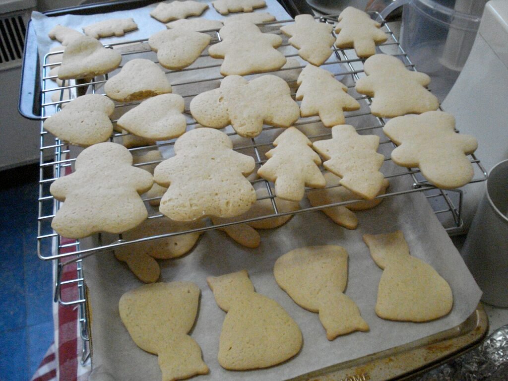 sugar cookies made with fine bakery sugar cooling on a rack